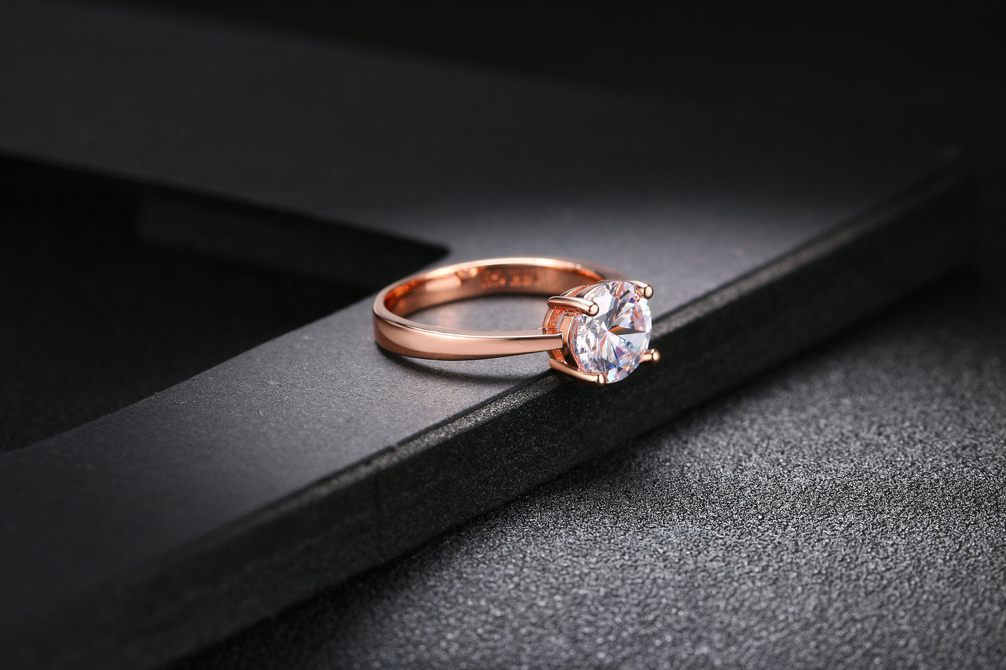 Rose gold and zircon ring